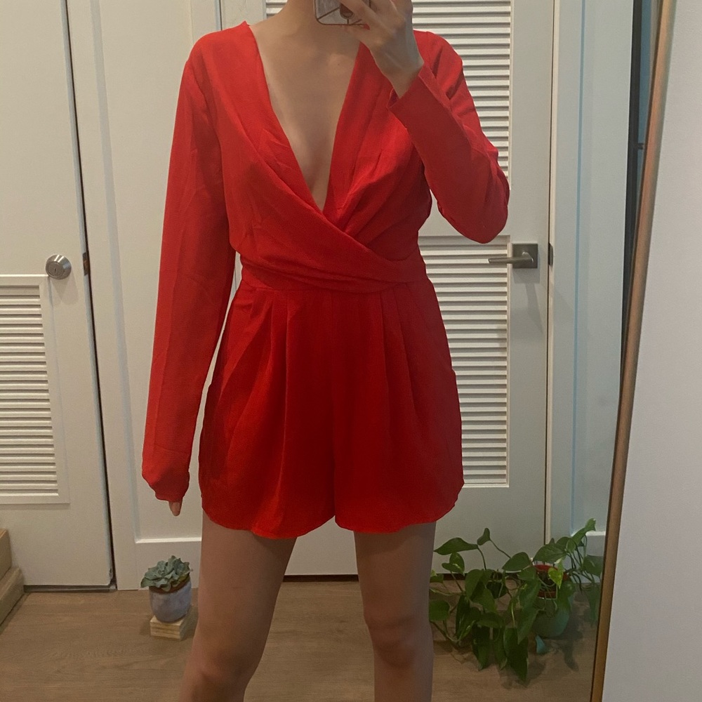 Red, one piece, v neck  romper.